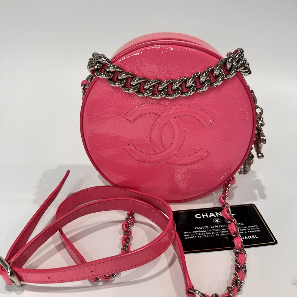 Chanel “Round As Earth” pink patent leather two way bag.